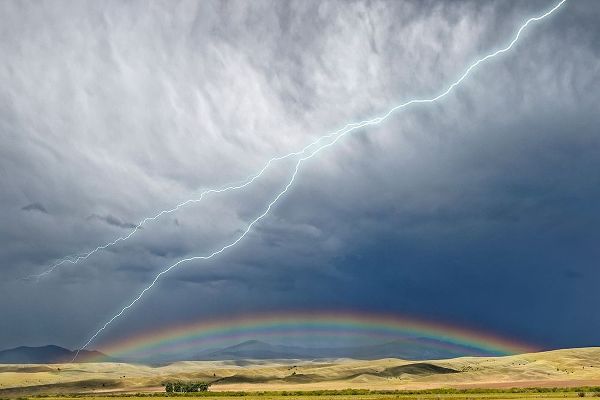 Montana-Galen Storm clouds with lightning and rainbow